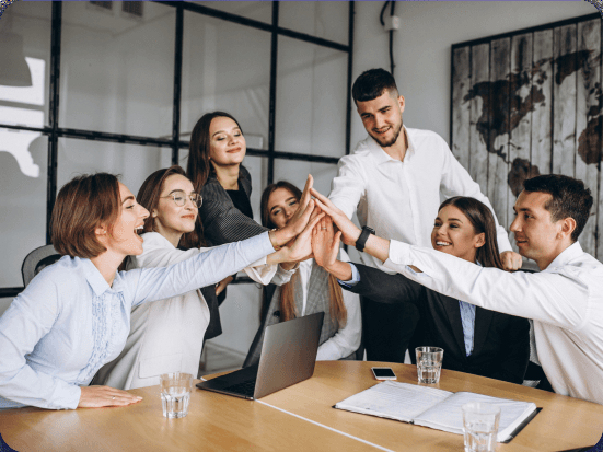 The Nivara Digital team working together around a meeting table